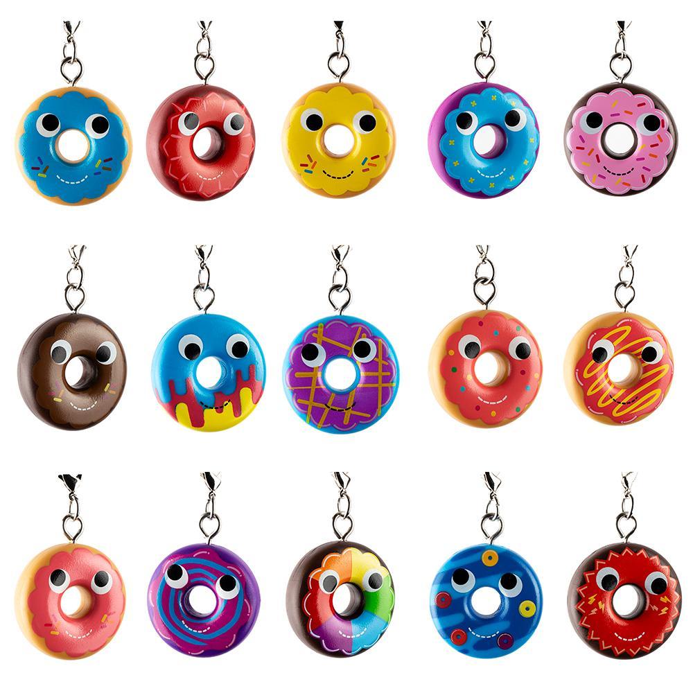 Yummy World Attack of the Donuts keychain by Kidrobot featuring a colorful vinyl donut design with metal accents.